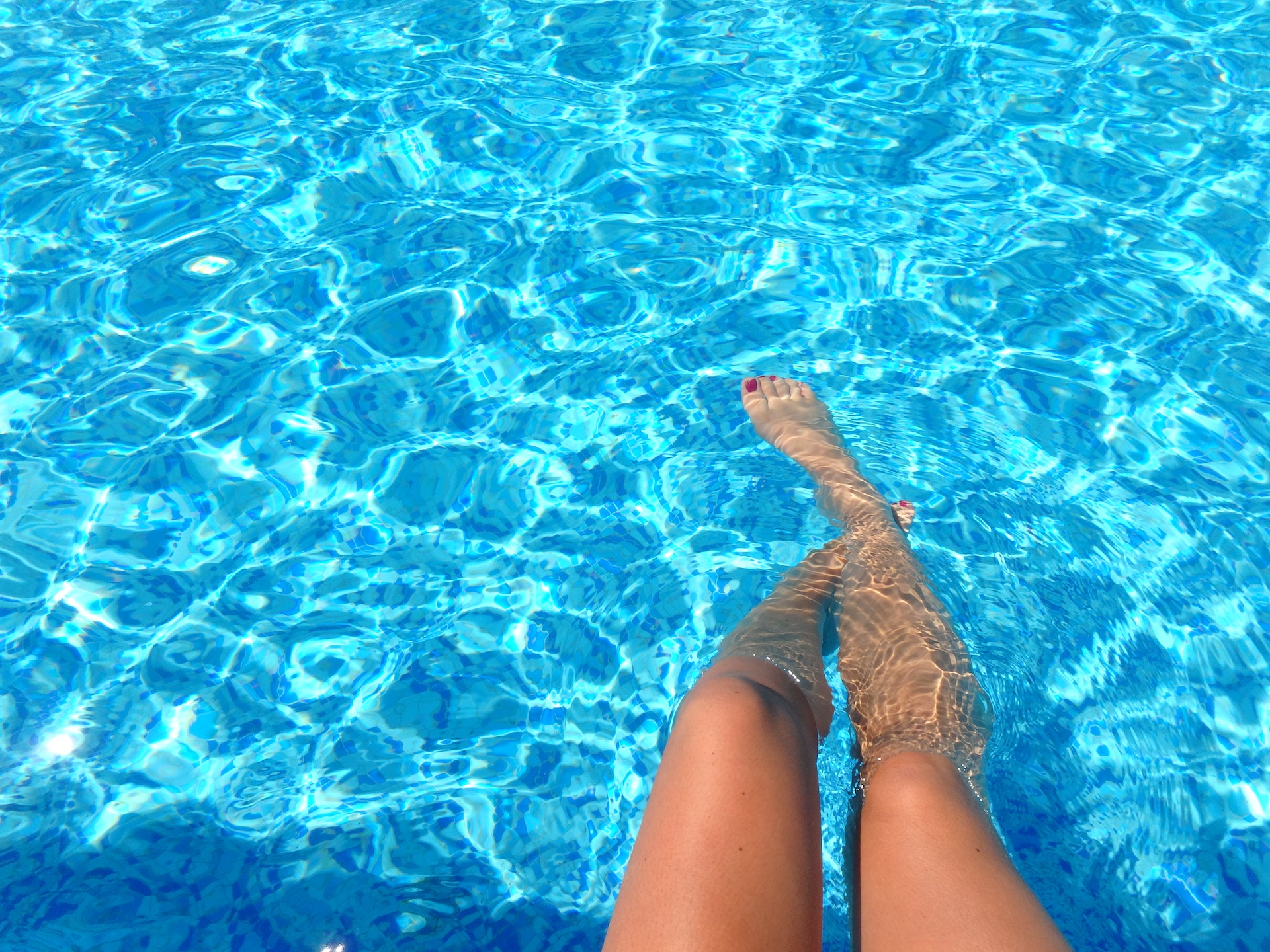 soaking feet at the pool